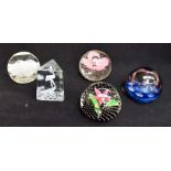 A collection of glass paperweights including makers Caithness etc