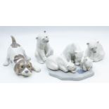 Four Lladro figures of bears and a dog