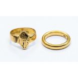 To 18ct gold rings to include a monogram ring, initialled H M, size L, along with a wedding band,