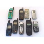 Collection of early mobile phones. Along with some chargers and cases. Not tested.