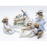 Four Lladro figures of young girls with flowers (one AF)