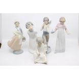 A collection of five Nao figures of young boys and girls