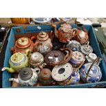 A collection of Chinese and Japanese teapots, Famille Rose, blue and white, Satsuma, 19th and