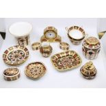 A collection of Royal Crown Derby 1128 Imari pattern including cup and saucers, ginger jars,