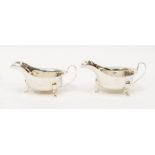 A matched pair of Georgian style silver sauceboats, by Viners, Sheffield, 1962 & 63, 6.80 ozt (211.5