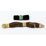 A Victorian mourning bracelet, comprising five rows of plaited hair with gold engraved terminals,
