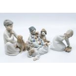 Four Lladro figures of small children and a child angel