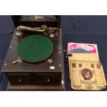 An Excelsior oak cased gramophone, complete with records