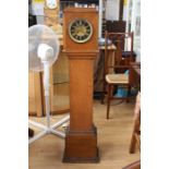 An early 20th Century oak cased mantel clock, converted to a grandmother clock, along with a mid