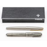 A 1950's fountain pen, along with a late 20th Century Parker Pen