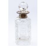 A silver and hobnail cut glass miniature spirit decanter, with silver collar (with later replacement