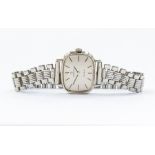 Omega- a ladies vintage Omega steel wristwatch, the cushion champagne dial approx 23 x 20mm, baton