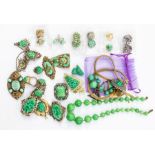 A collection of oriental themed costume jewellery to include  white and gilt metal rings,