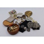 A white metal nurses belt with white metal compact, costume jewellery, cuffs, coins and pen
