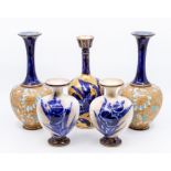 A pair of Doulton Slater vases, a pair of Doulton Burslem and another Staffordshire vase