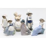 A collection of six Nao figures of young children