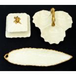 Three pieces of Carlton Ware, in white glaze with gilding, comprising oblong single handled leaf