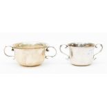 An Edwardian plain silver porringer by Stokes & Ireland Ltd, London, 1909 and another smaller,