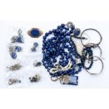 A collection of jewellery to include a silver/white metal set lapis lazuli bangle, earrings, ring