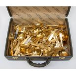 Two cases of assorted Bestecke Solingen gold plated and stainless steel cutlery, various settings