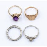 A collection of 9ct gold rings t include an amethyst ring size H, a 9ct gold seal ring, size H1/2,