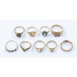 A collection of eight 9ct gold stone set dress rings to include an emerald and diamond cluster,
