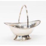 A George V silver navette shaped swing handled sugar bowl, by Joseph Rodgers, Sheffield, 1916,