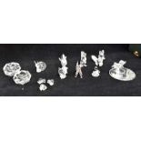 A collection of Swarovski glass figures including hare, dog, bird, plus various miniatures, some