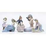 Nao figure of mermaid and four other Nao figures of girls with birds and dogs