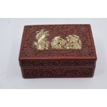A Chinese Cinnabarr red lacquered box, having bone decoration, black lacquered interior
