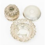 A collection of silver to include: An Edwardian shaped circular dish with flared rim chased with