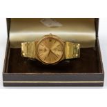 Longines- a gents gilt metal Longines wristwatch, round gold tone dial, baton markers with date