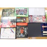 A collection of assorted football memorabilia and board games to include: France 98 Trivial Pursuit;