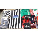 A collection of assorted football memorabilia to include a replica Juventus shirt, Danone sponsor,