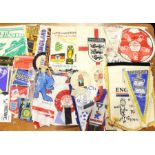 A large collection of assorted rosettes, pennants and other football memorabilia to include: Inter