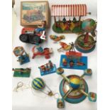 Tinplate: A collection of assorted tinplate toys, some clockwork, to include B&S of Western