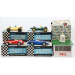 Scalextric: A collection of four boxed Scalextric slot cars to comprise: B.R.M. C59, red, #7,