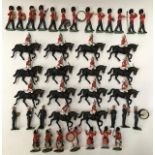 Britains: A collection of assorted Britains 1960’s Eyes Right Guards Band along with Hong Kong Scots