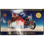 Franklin Mint: A boxed, Harley Davidson Christmas 2002 limited edition. In original packaging with