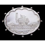 Railwayana Interest: A silver hallmarked, oval brooch, engraved with Stephenson's Engine, 'S & D R