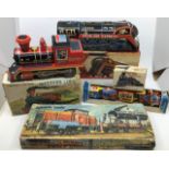 Tinplate: A collection of assorted vintage tinplate trains including Masudaya (Modern Toys Japan)