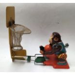 Tinplate: A 1960's Japanese clockwork tinplate basketball monkey made in Japan by TPS (Tokyo