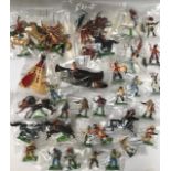 Britains: A collection of assorted Britains Western figures including Canoes, Tee Pee, Horses etc.