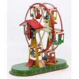 Johann Wagner: A Johann Wagner, tinplate, clockwork, Big Wheel, German, rounded rectangular base,