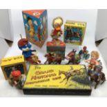 Tinplate: A collection of assorted tinplate and plastic clockwork toys including: Smurf on tricycle,
