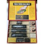 Trix: A Trix Twin Railway Passenger Train Set, American 9/331 contains 0-4-0 locomotive and tender