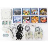 Dreamcast: A collection of assorted Sega Dreamcast items to include: unboxed console, three