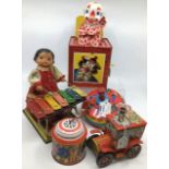 Tinplate: A collection of assorted vintage tinplate toys including Mettoy Jack in the box, space