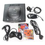 Sega: A boxed Sega Saturn console, complete with instructions, one controller, Scart and AV Lead,