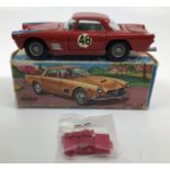 Diecast: A boxed Mercury Maserati 3500 GT no. 24, in original box with unopened set of luggage. Some